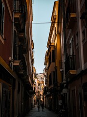 Fototapeta premium Narrow street in Palma de Mallorca, Spain