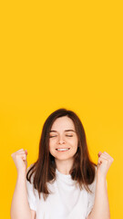 Exhilarated Woman Celebrating Big Win with Raised Fists - Excitement, Victory, and Financial...