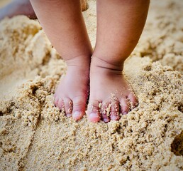feet on the beach