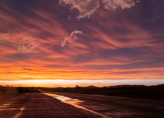 Fototapeta na wymiar Sunset view of beautiful clouds and lighting in Wichita Mountains National Wildlife Refuge