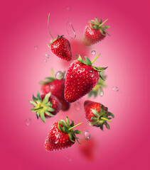 Composition of strawberries with water drops in the air. food levitation. concept