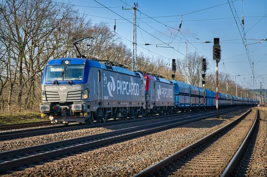 Locomotive freight train driving in the countryside