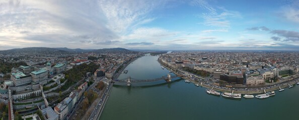 Panoramic shot of the Budapest skyline with Szechenyi Chain Bridge over Danube river