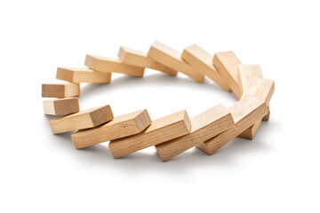 Circle made of toppled wooden blocks on a white background, including clipping path