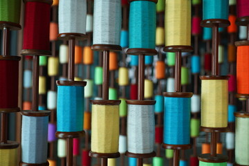 Lots of colorful spools of thread