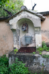 Ancient water well in the  Benedictine hermitage of  Saint Maria degli Angeli, Nola, Naples, Italy.