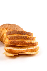 Sliced bread with a crispy brown crust on white background.