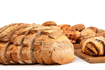 Sliced bread with a crispy brown crust on white background.