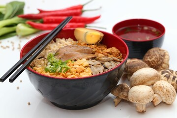 Closeup of noodles with chicken, mushrooms and cheese