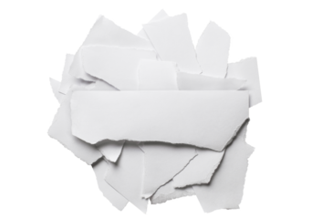Ripped pieces of paper with a blank piece on top for a short text, cut out