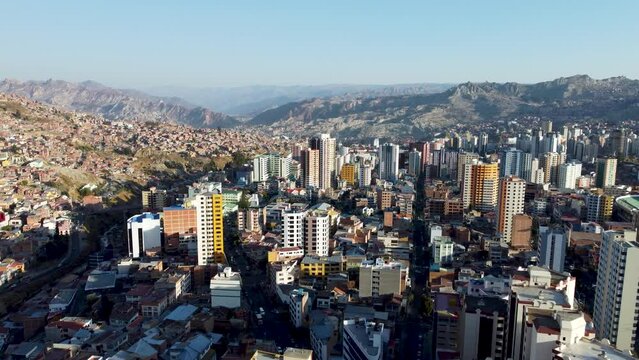 4k aerial footage of La Paz city, Bolivia with mountains and cloudy sky on a sunny day