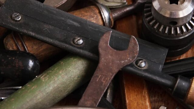 Various vintage hand metal tools closeup