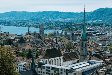 Cityscape view of the city of Zurich buildings, Fraumunster Church by Lake Zurich, Switzerland