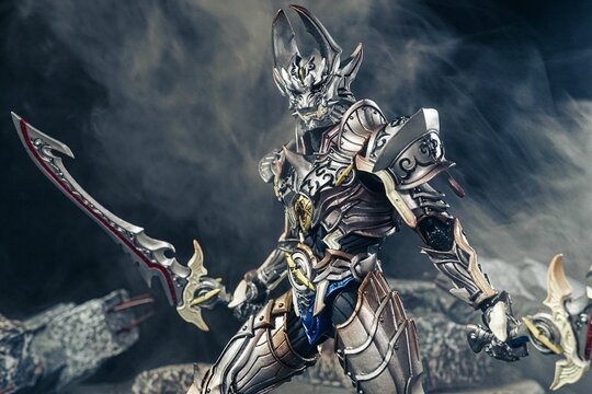 Closeup shot of Makai Kado Ginga Kishi Zer figure on dark background filled with smoke
