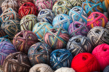 Fototapeta na wymiar closeup of colorful woolen balls at the market