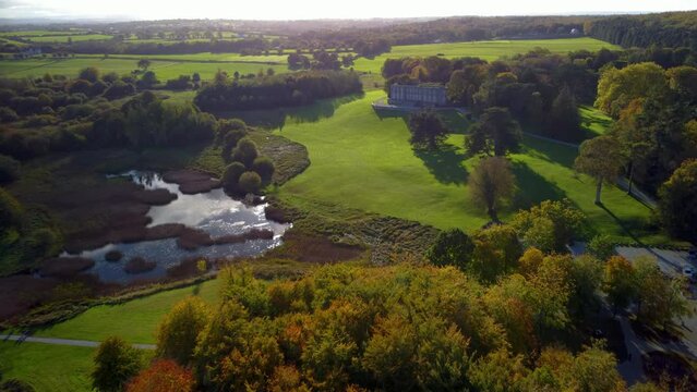 High-angle shot of an old castle in the green park and valley in Limerick, Ireland.