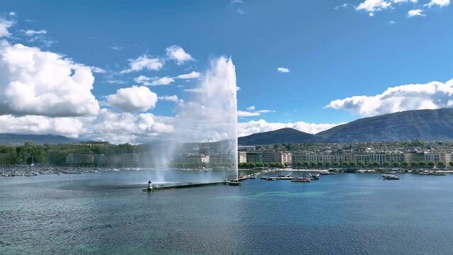 Aerial shot over a fountain in geneva lake, switzerland