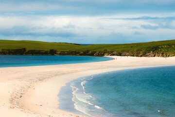 Beautiful view of the sea in Shetland, Scotland on a sunny day