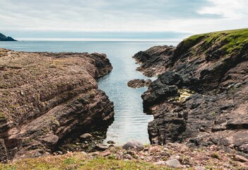 Beautiful view of the sea in Shetland, Scotland on a sunny day