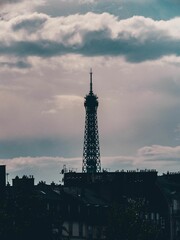 Fototapeta na wymiar Shots of the Eiffel Tower sneaking thru the streets of Paris
