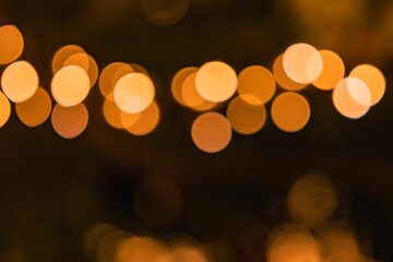 Beautiful background with bright golden bokeh lights