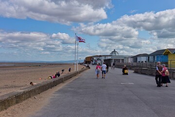 people walking on the beach
