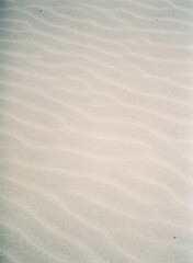 Vertical shot of wavy sandy dunes
