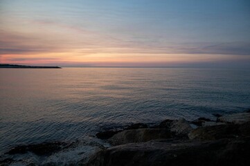 Fototapeta premium Beautiful landscape of the sea on the sunset