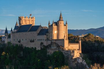 Fototapeta na wymiar Distant view of the Segovia castle at dusk, Spain