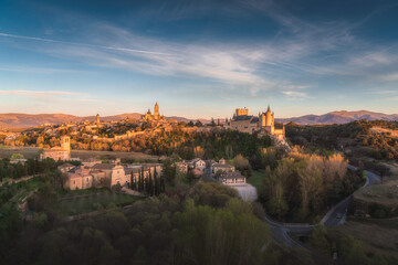 Naklejka premium Segovia city skyline at dusk, with the cathedral and castle