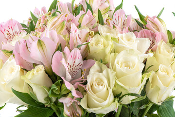 Close-up of a beautiful bouquet of blooming roses and alstroemerias.