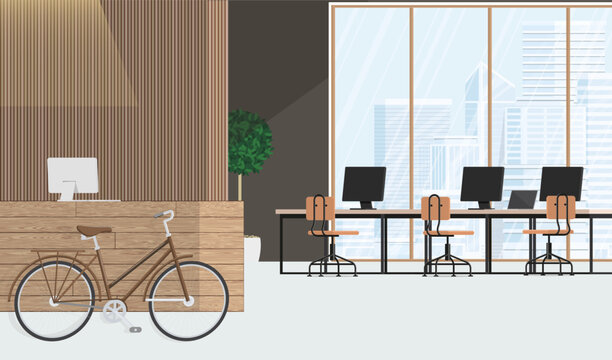 Creative office interior with bicycle, reception desk, several desks with computer monitors and panoramic city view.