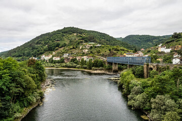 Fototapeta na wymiar View of the village of Os Peares, Ourense, Galicia in Spain, where the Sil and Mino rivers converge.