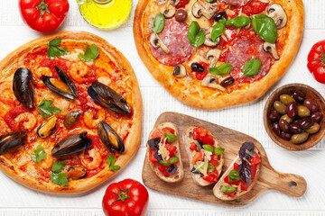 Italian cuisine. Pizza and toasts