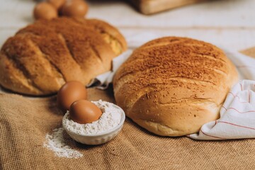 Closeup of baked bread with eggs