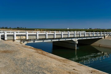 Bridge over an irrigation canal in California Central Valley