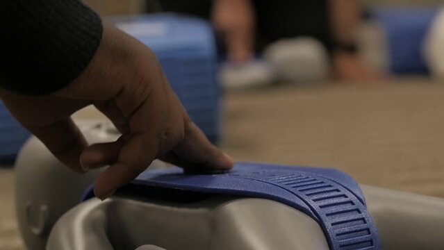 Female Muslim trainee learning how to conduct cpr and first aid