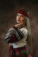 ukrainian young woman wear vyshyvanka traditional Ukrainian clothing on black background