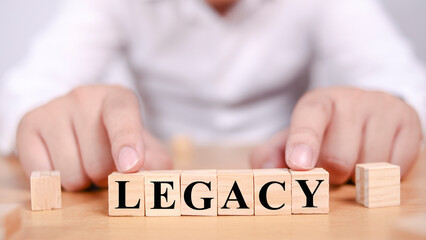 Legacy, text words typography written with wooden letter, life and business motivational...