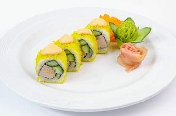 Closeup of sushi on a plate isolated on white
