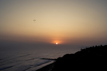 Sunset in la Costa Verde (Green Coast) in Lima, Peru - 612532046