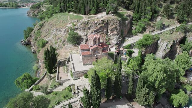 Aerial view of Ohrid with Kaneo beach and church. UNESCO protected heritage - Macedonian Orthodox Church of St. John the Evangelist, located on a cliff above the Kaneo beach