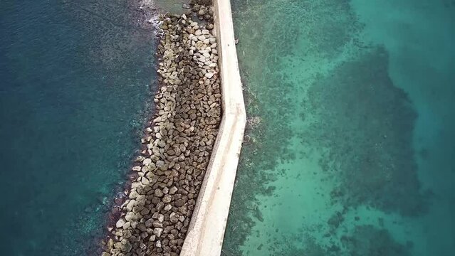 Aerial of a beautiful view over a breakwater in the Old Town of Chania in Greece