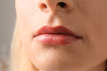 Perfect lips of a girl close-up.
