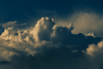 Fototapeta na wymiar Clouds in the dramatic moody sky at sunrise