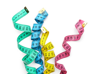 Measuring tapes on white background