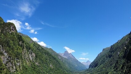 Blue sky over scenic green hills