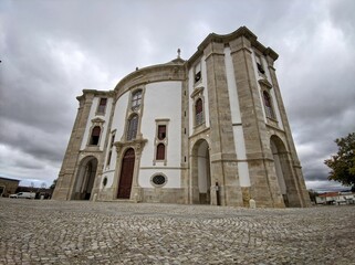 Fototapeta na wymiar Low angle shot of the Sanctuary of the Lord of the Stone Catholic church in Obidos, Portugal