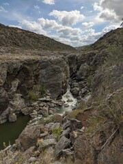 Vertical shot of the Pulo do Lobo waterfall in Mertola, Portugal