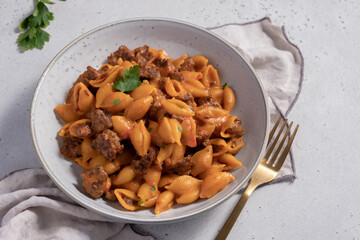 Cheeseburger Pasta with meat, tomato sauce, vegetables and cheese